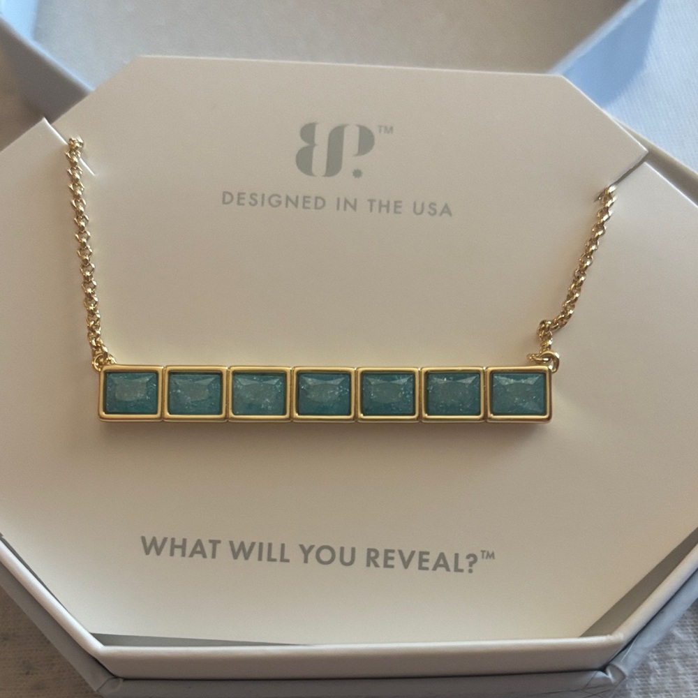 Elegant Gold and Blue Necklace